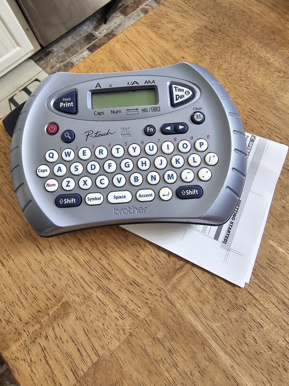 Brother P-touch Label Maker in Silver and White